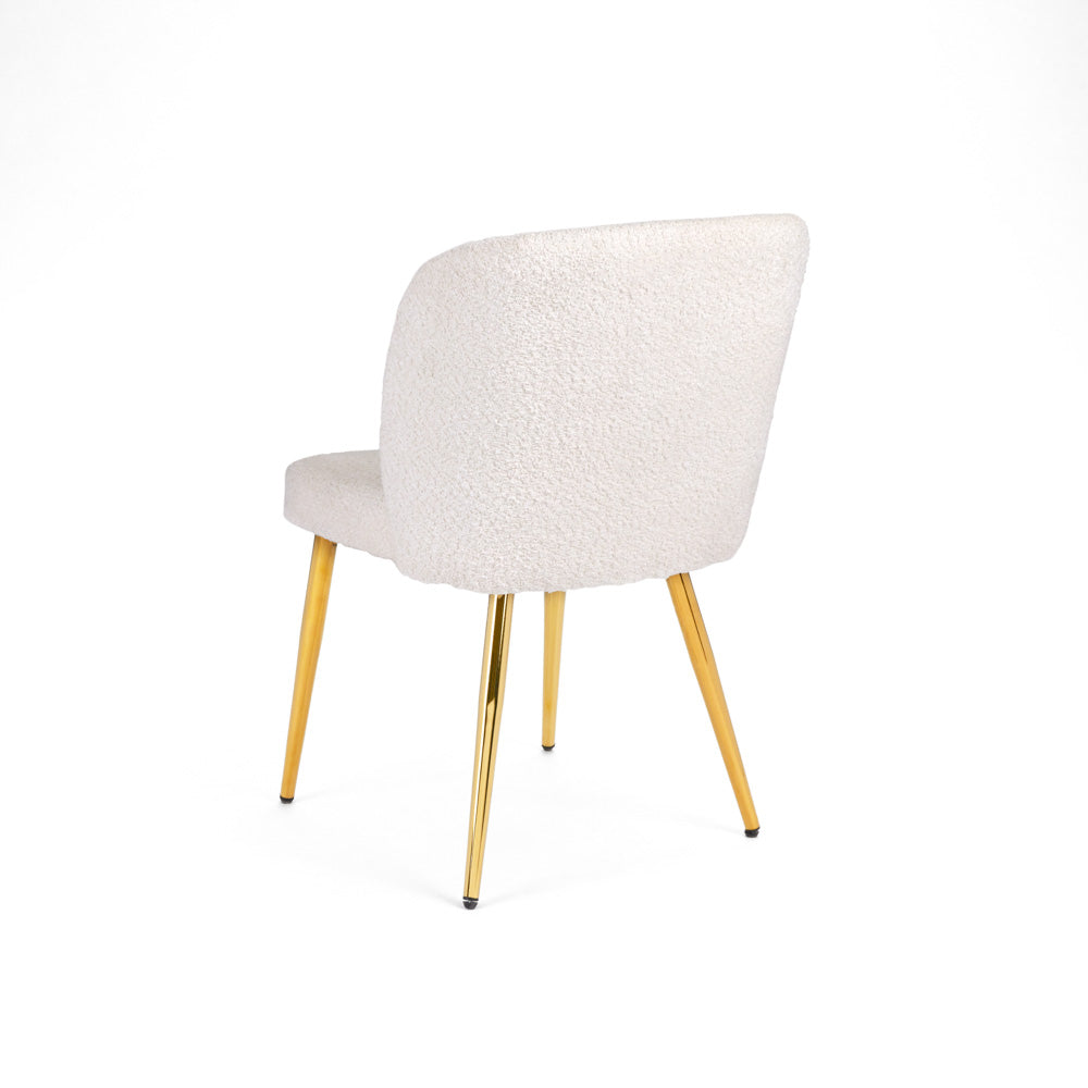 Chaise de salle à manger Fortina : tissu en fourrure blanche avec pieds dorés