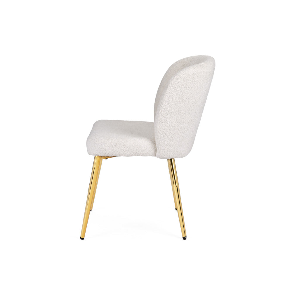 Chaise de salle à manger Fortina : tissu en fourrure blanche avec pieds dorés
