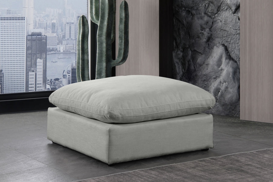 Pouf confortable en tissu texturé en lin