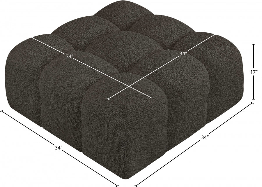 Pouf Ames en tissu bouclé