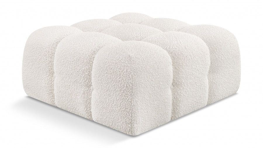 Pouf Ames en tissu bouclé