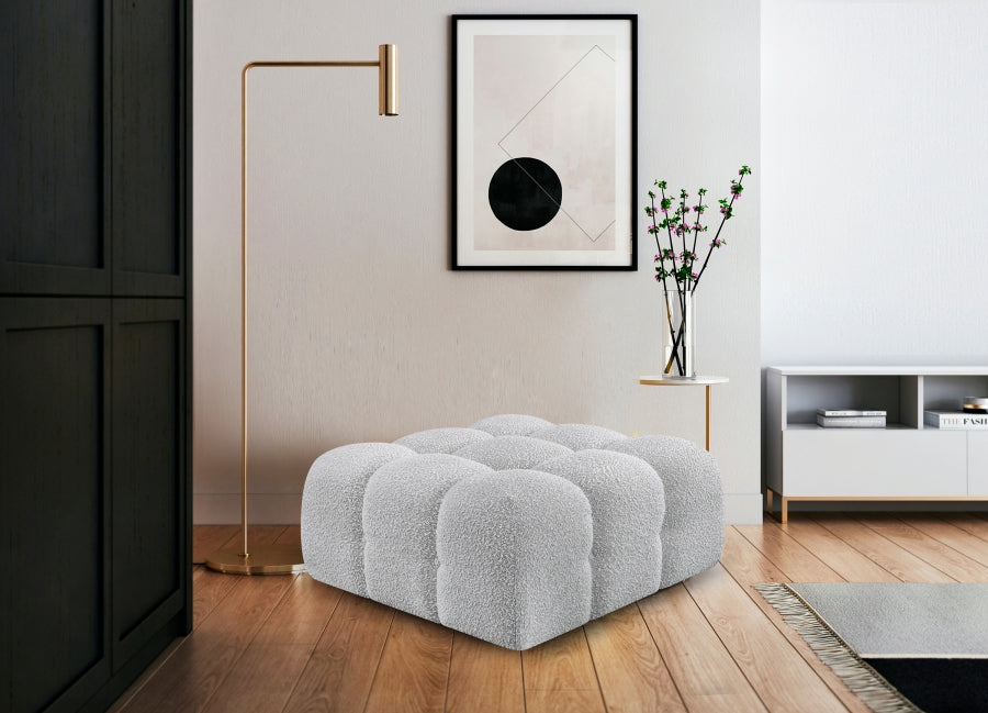 Pouf Ames en tissu bouclé