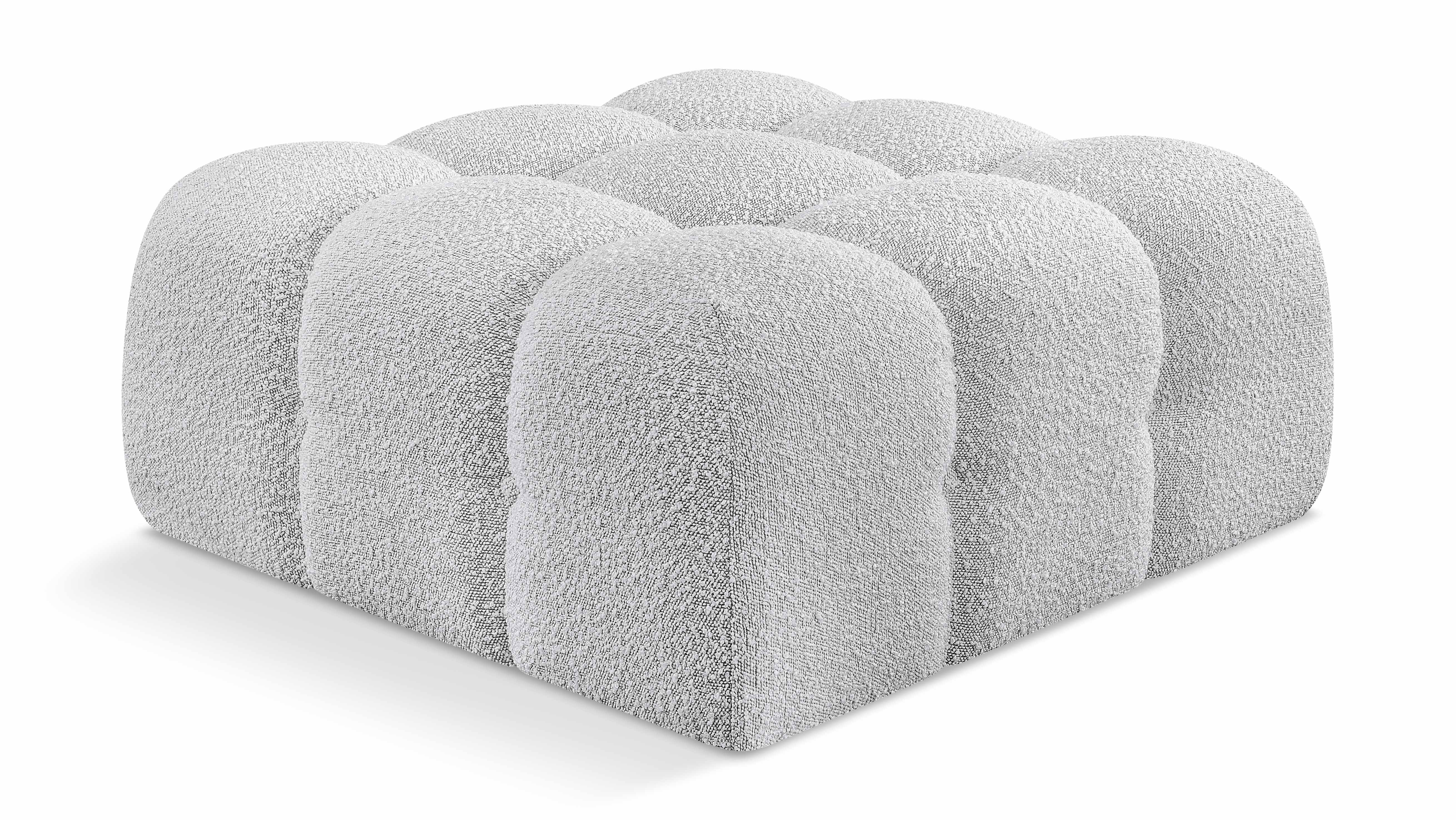 Pouf Ames en tissu bouclé