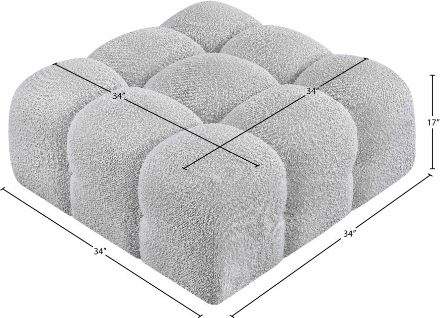 Pouf Ames en tissu bouclé