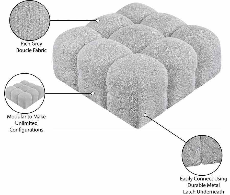 Pouf Ames en tissu bouclé