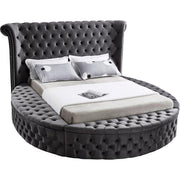 Lit en tissu velours gris avec capitonnage profond et 3 bancs de rangement