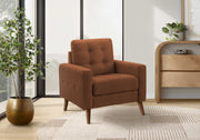 Brown armchair in a modern living room with plants and a side table.