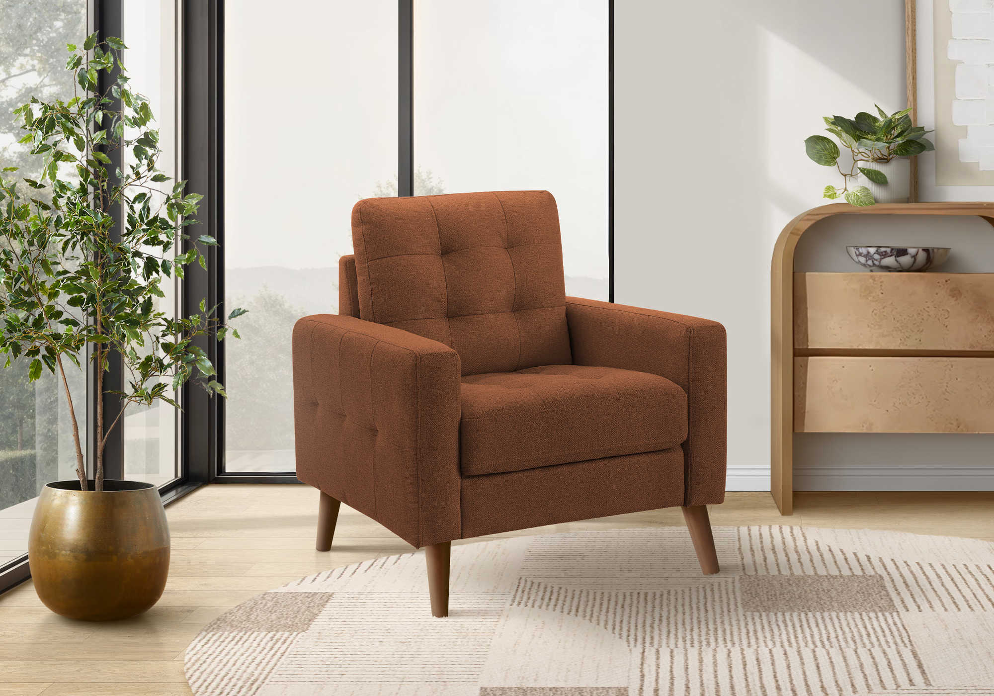 Brown armchair in a modern living room with plants and a side table.