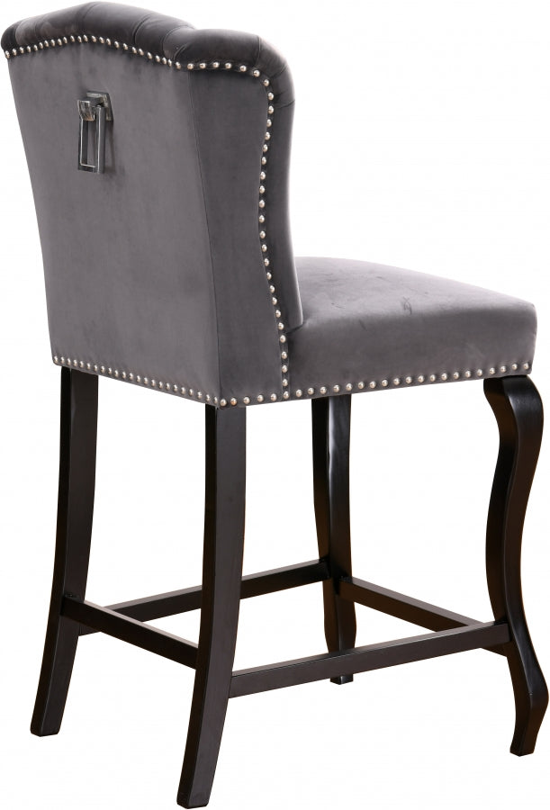 Tabouret de comptoir en velours Suri