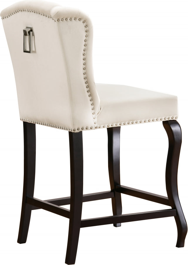 Tabouret de comptoir en velours Suri