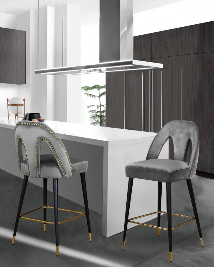 Tabouret de comptoir en velours Akoya