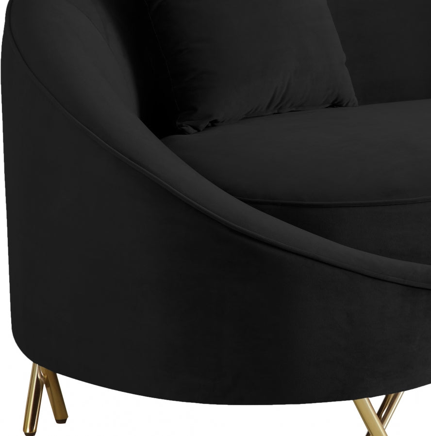 Causeuse serpentine en velours 