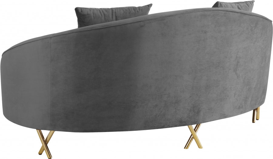 Causeuse serpentine en velours 