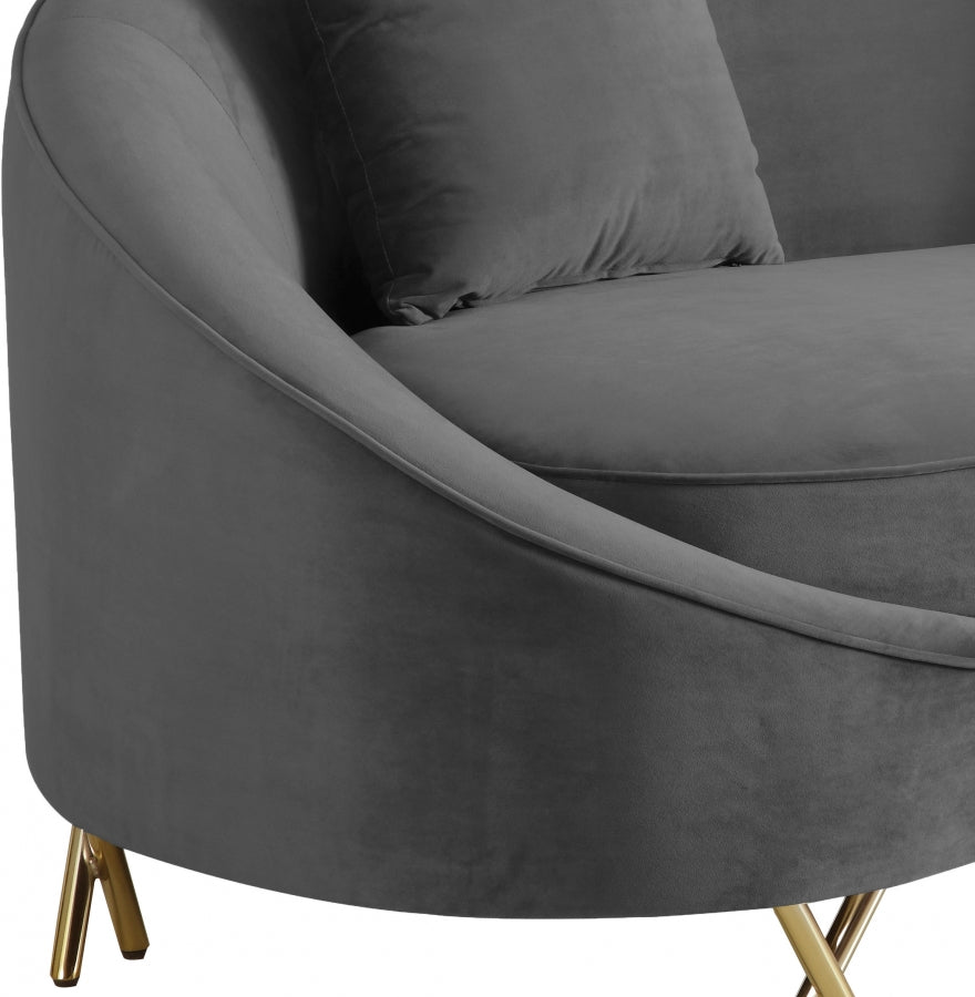 Causeuse serpentine en velours 