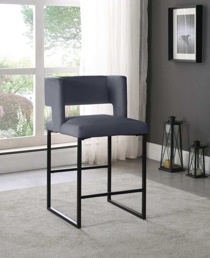 Tabouret de comptoir en velours Caleb